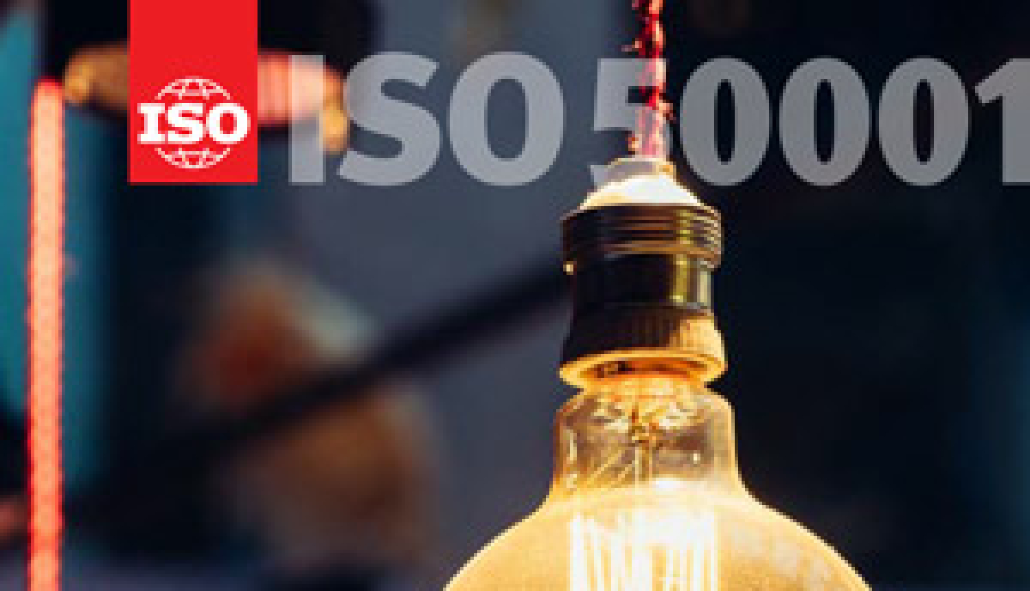 ISo žurnāla vāks ar spuldzīti un ISO 50001 standarta nosaukumu